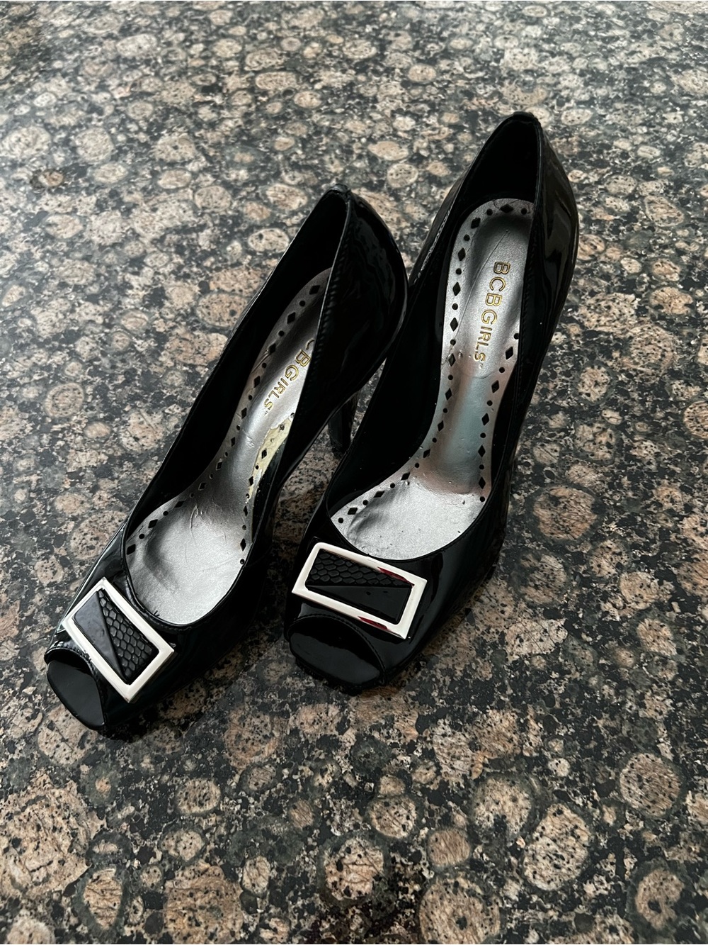 BCBGirls Black Patent Peep-Toe Heels with Silver Buckle